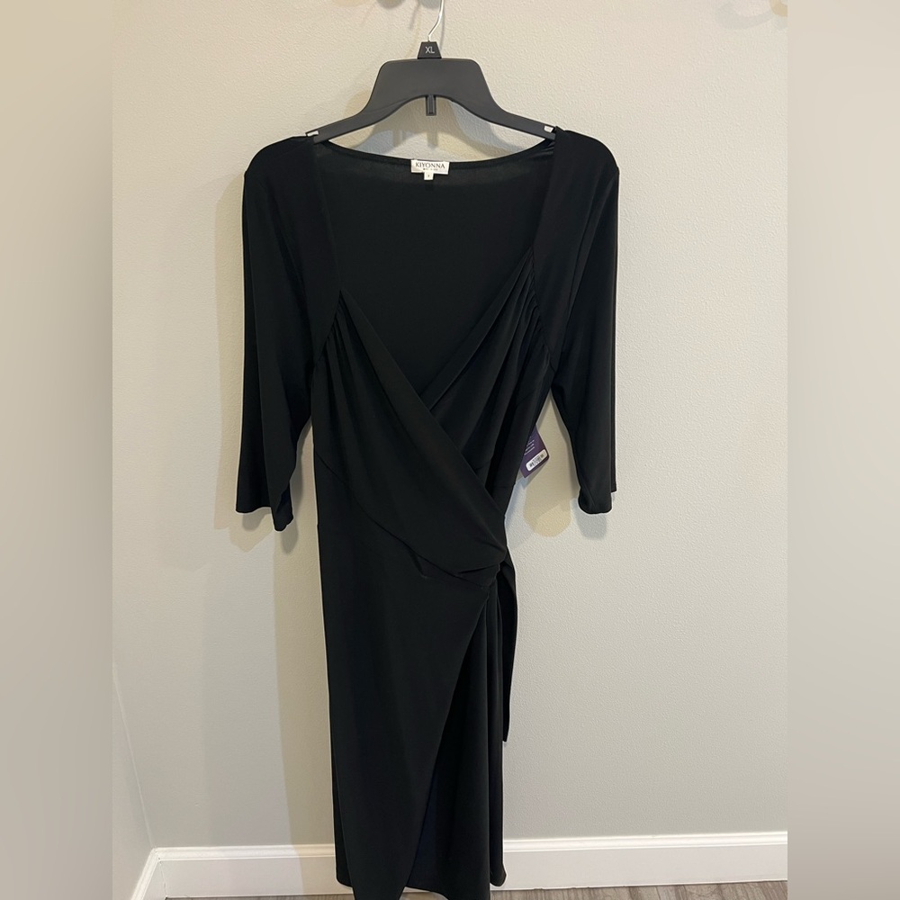 Black wrap dress, never worn.